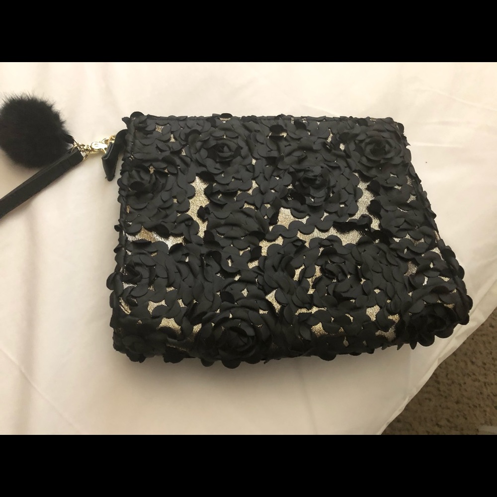 Two lace clutches